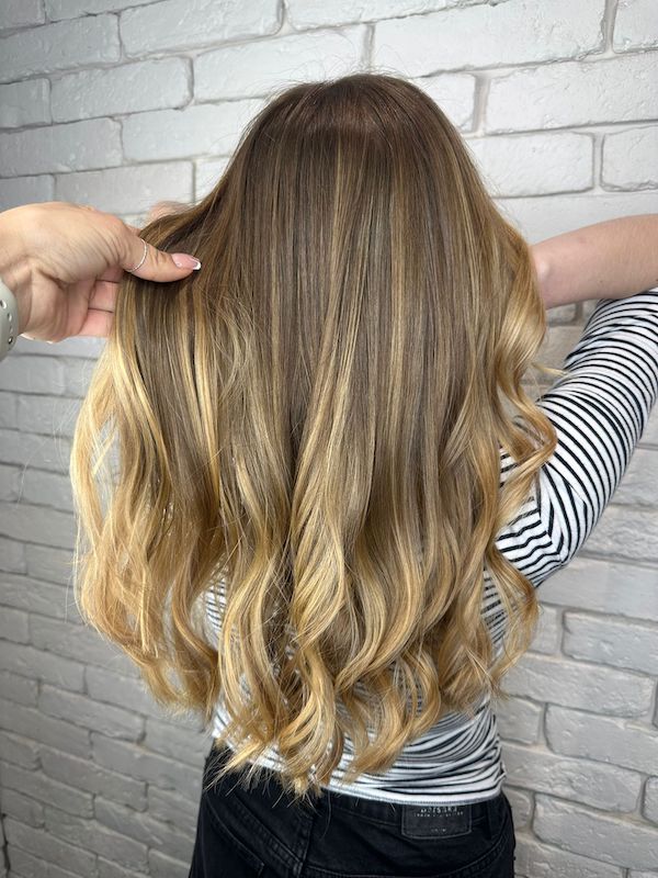 Light Brown hair with a natural blonde balayage