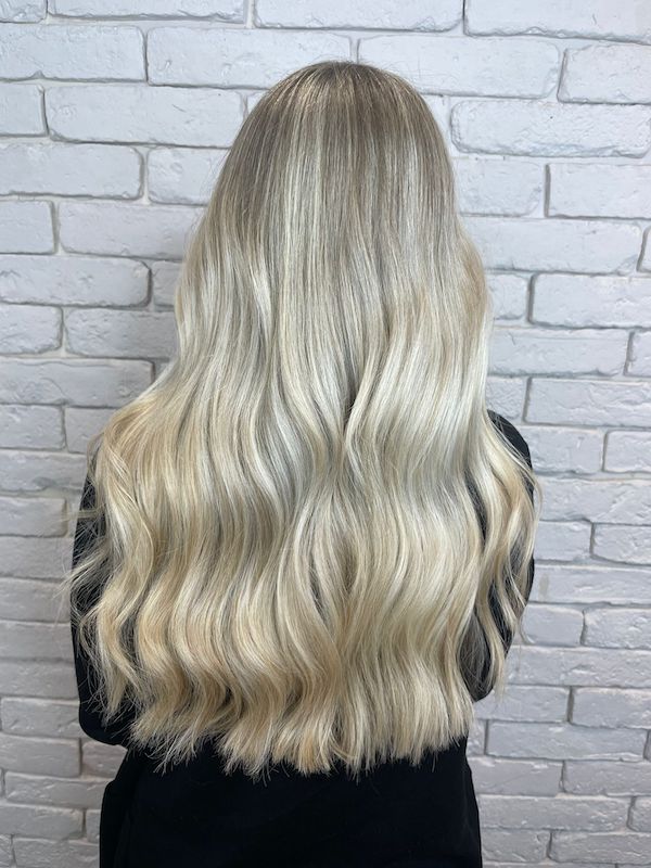 bright cool blonde thick curled hair