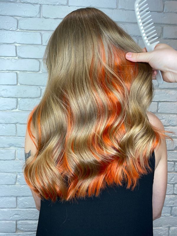 blonde hair with pumpkin orange hidden under panel