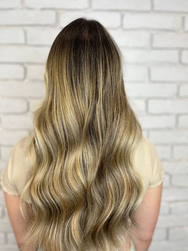 blond balayage with dark brunette roots