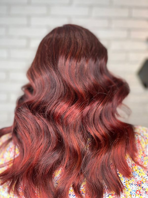 dark crimson red hair with dark roots